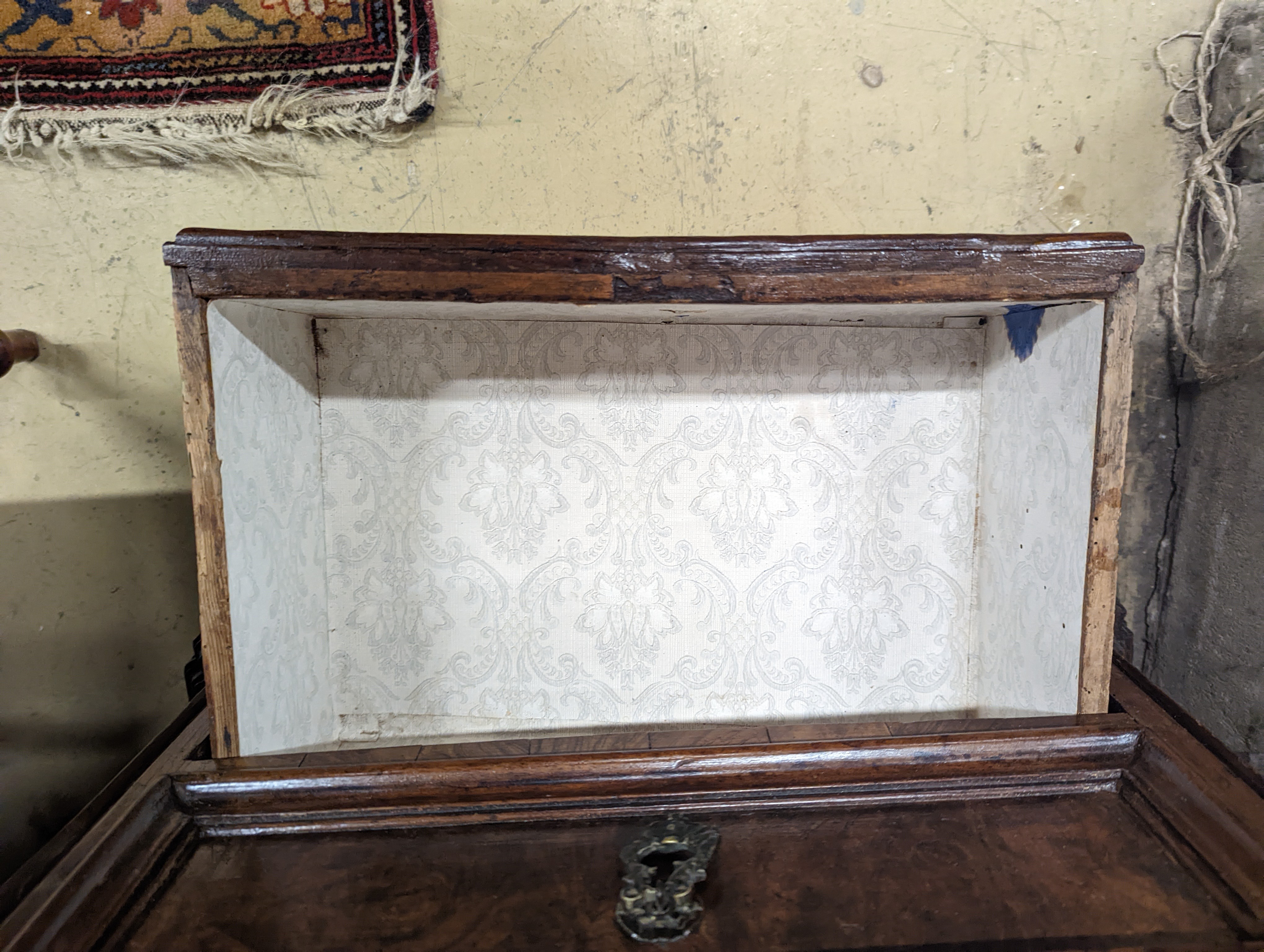 An 18th century North Italian walnut four drawer chest, width 65cm, depth 33cm, height 79cm